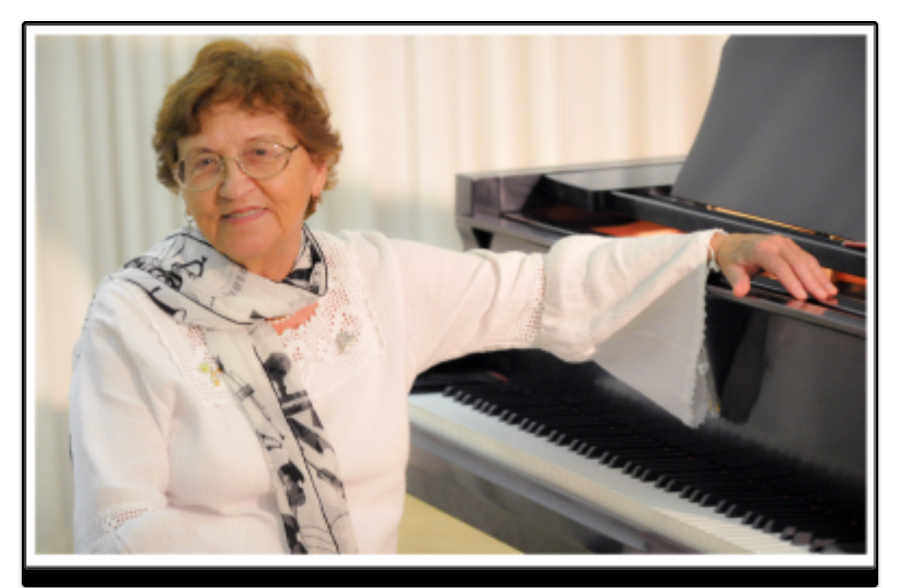Faina Bryanskaya and grand piano.